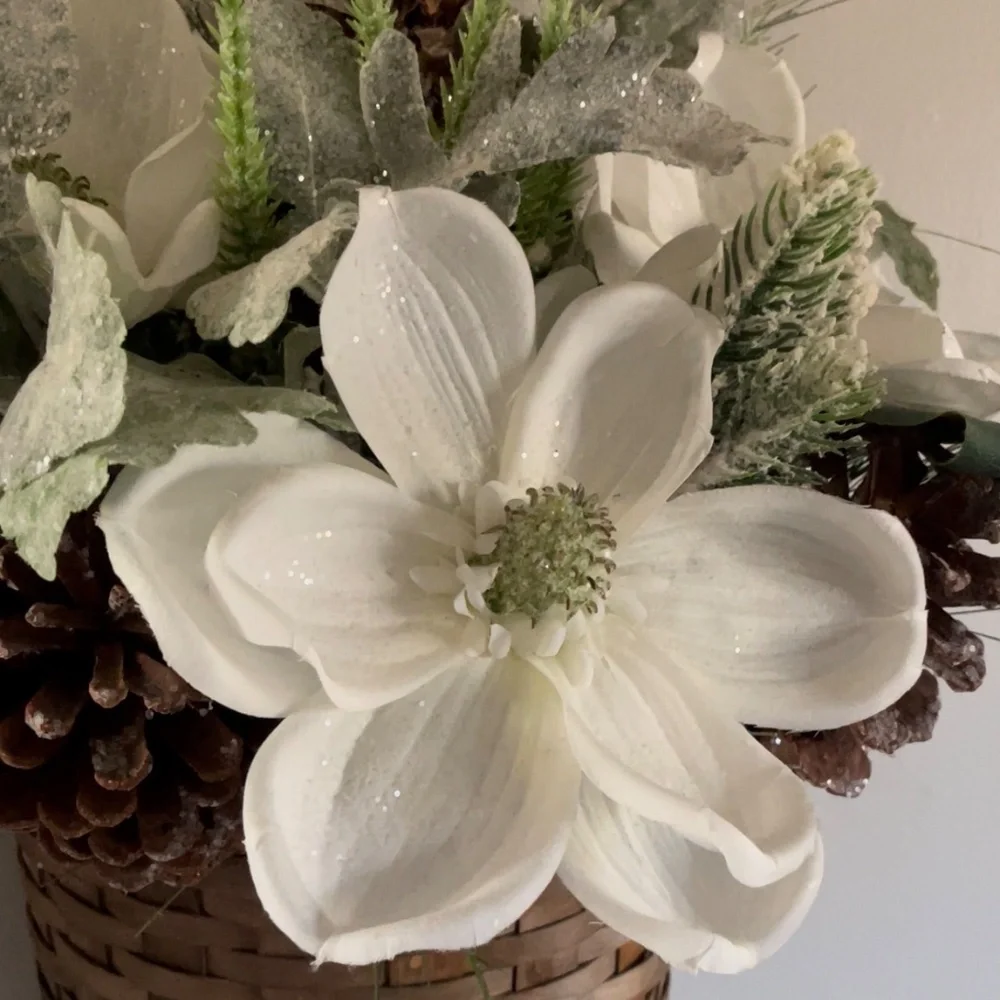 Winter hanging basket floral decor pinecones white flowers pine needles wreath